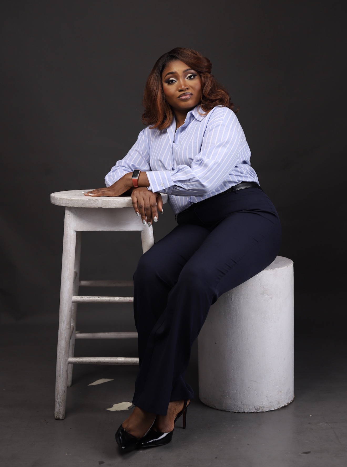 Omotoyosi speaking on stage